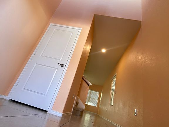 Welcome to your new house! __ 
Entrance with a high ceiling.