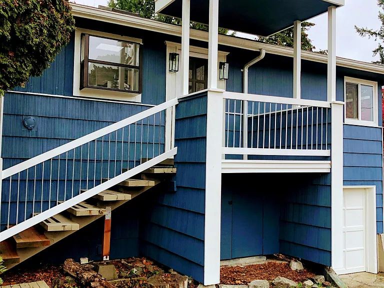 Newly remodeled Magnolia Home. Front of house along well maintained alley with direct access to deep single car garage and room for 1-2 additional parking spots