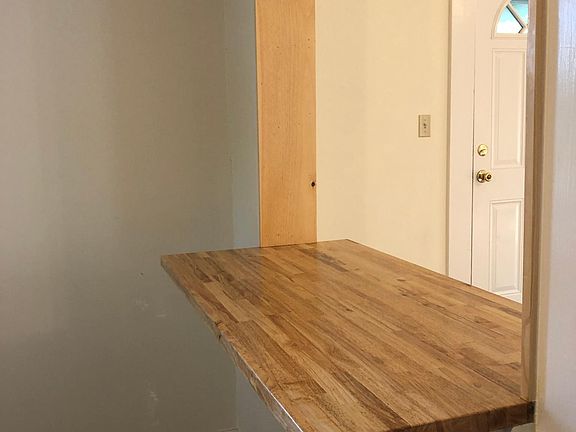 Butcher-top counter, great for entertaining or casual dining.