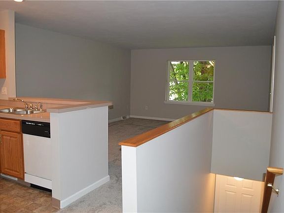 kitchen opens up into the living room
