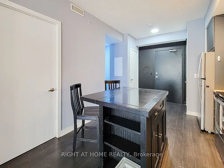 5260 Dundas St #306 — Photo 11
