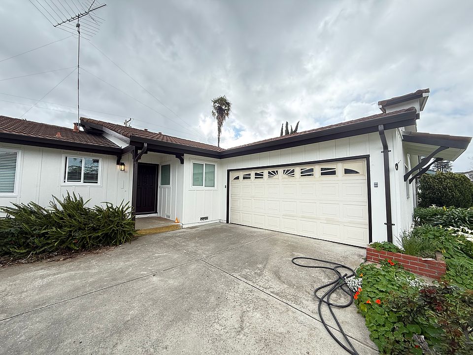 Front view with 2 car garage.