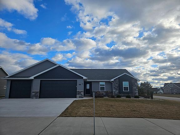 Family-friendly executive home with a move-in ready yard in desirable Greenville subdivision.