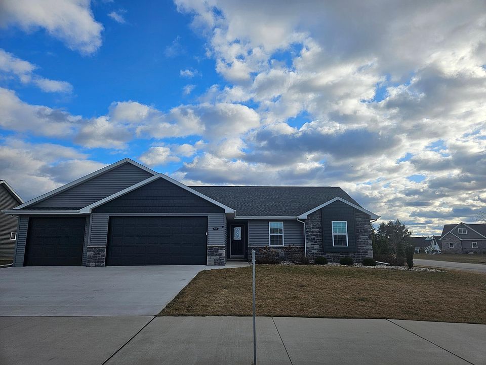 Family-friendly executive home with a move-in ready yard in desirable Greenville subdivision.