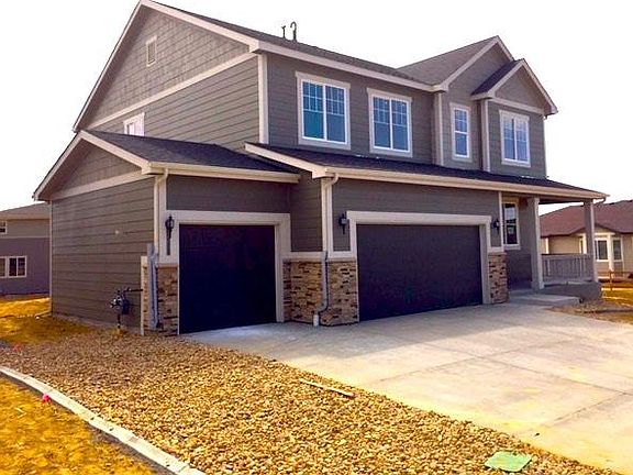 12660 Sunset Drive at Barefoot Lakes in Firestone!