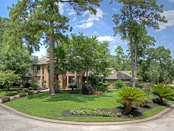   Private corner lot with lush landscaping.