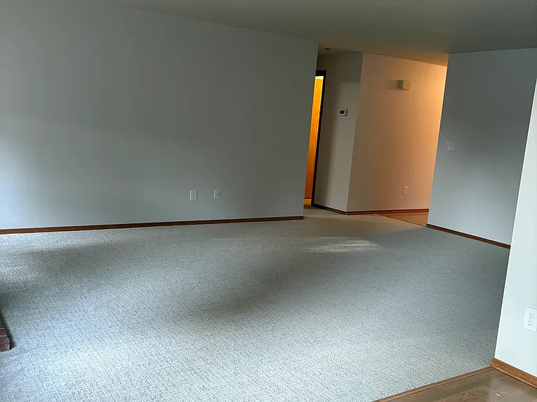 View from Dining room to the main living area/bedrooms