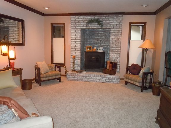 living room with wood stove