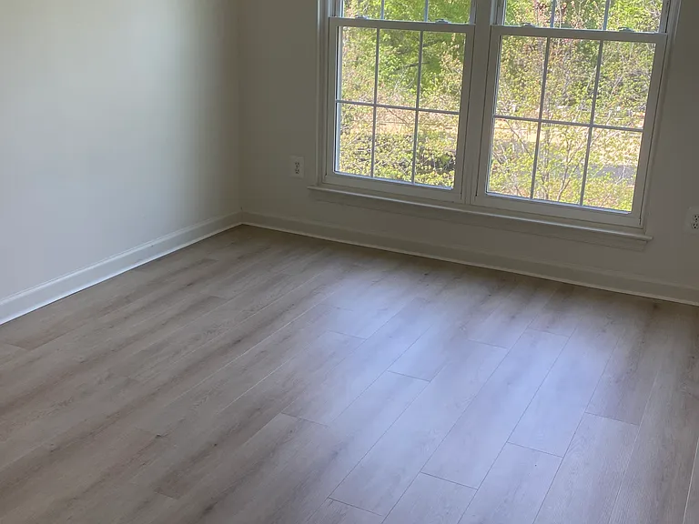 Second bedroom with large windows