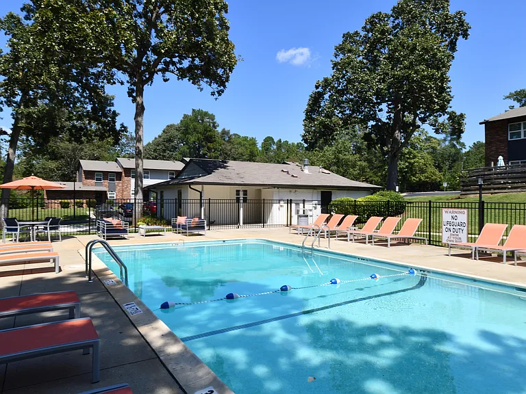 Pool area with lounge chairs