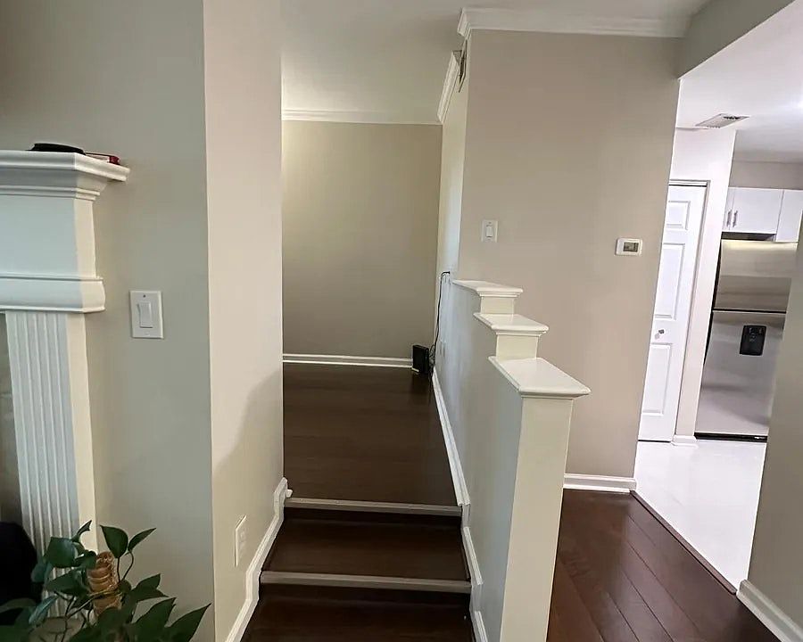 Multiple living areas flow through the open