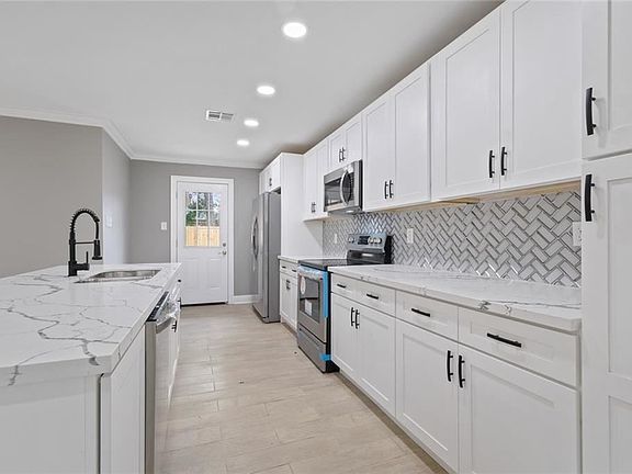 4th image of 7713 Sandy Cove Dr