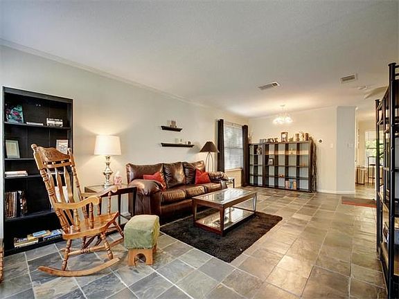 Most of the downstairs has beautiful slate floors, which have been sealed.  The floors gleam and give the home a very updated, elegant look.  There is no carpet in this home!