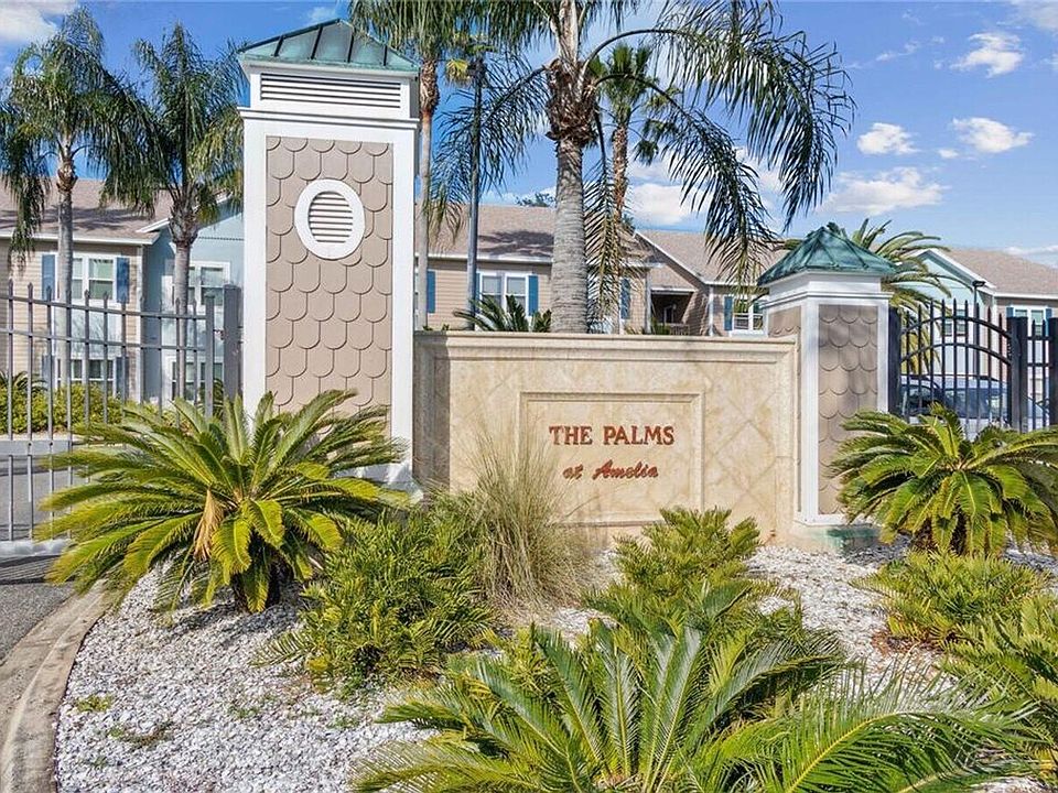Gate with The Palms sign