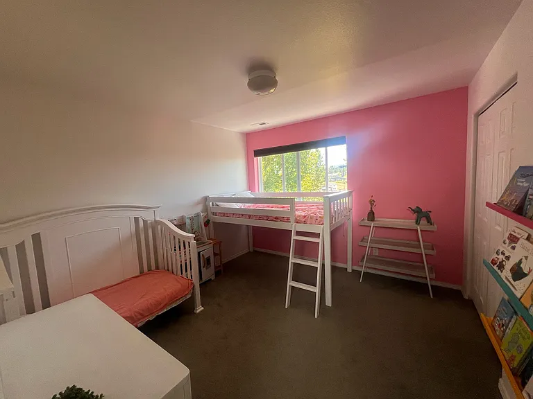 Bedroom 2- twin bunkbed, toddler bed, dresser, shelf and closet