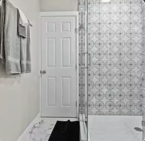 Master Bathroom- Ensuite to Master Bedroom and Guest Bedroom 3.
Single vanity, Large stand-up shower w/glass enclosure