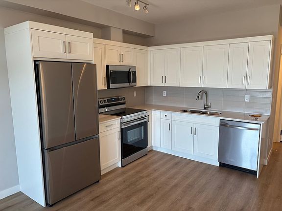 2nd image of 60 Sage Hill Walk NW #415