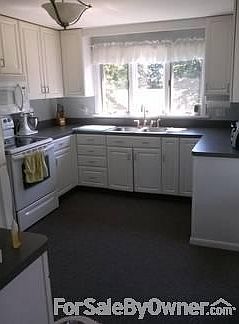 Cook's Dream
						:
						Appliances are newer & in great working order. Lots of storage in large pantry.