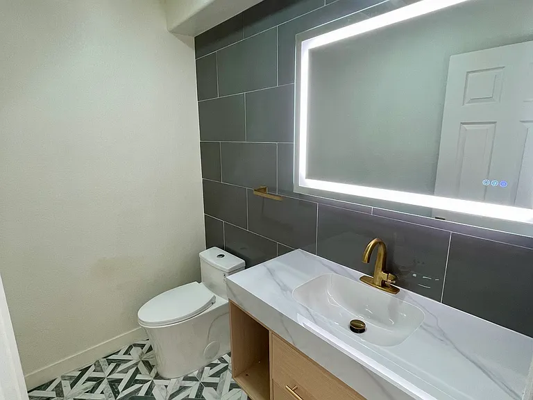 another angle of 1/2 bathroom on first floor