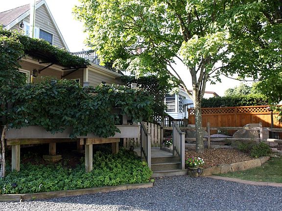 Rear of house - stairs to the 2nd floor entrance are across