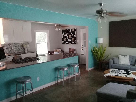 Open plan living, dining & kitchen.