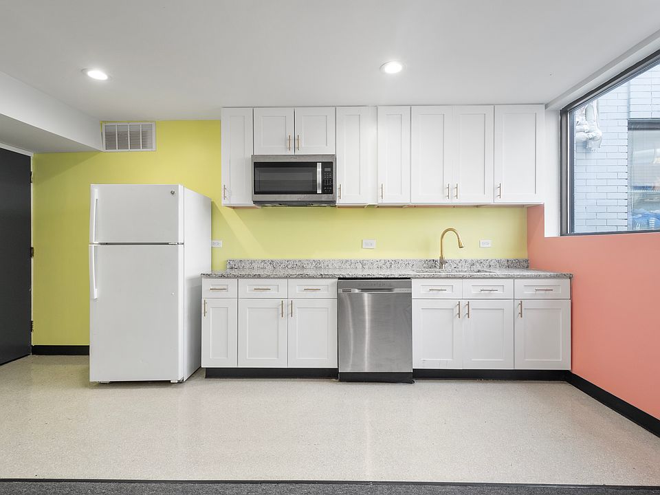 A new range will be located conveniently under the microwave, 
The kitchen will be updated with a stunning new island, The island also features a seated bar area, perfect for casual dining or entertaining guests.