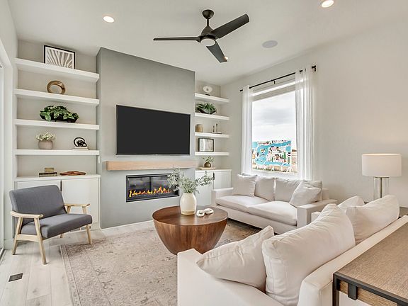 The Adventurer Living Room Fireplace Daybreak Contempo Collection Cascade Village