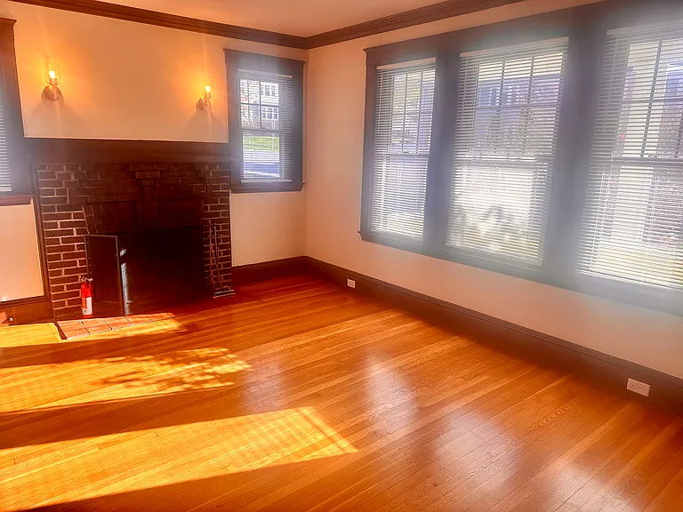 Sunny living room with venetian blinds