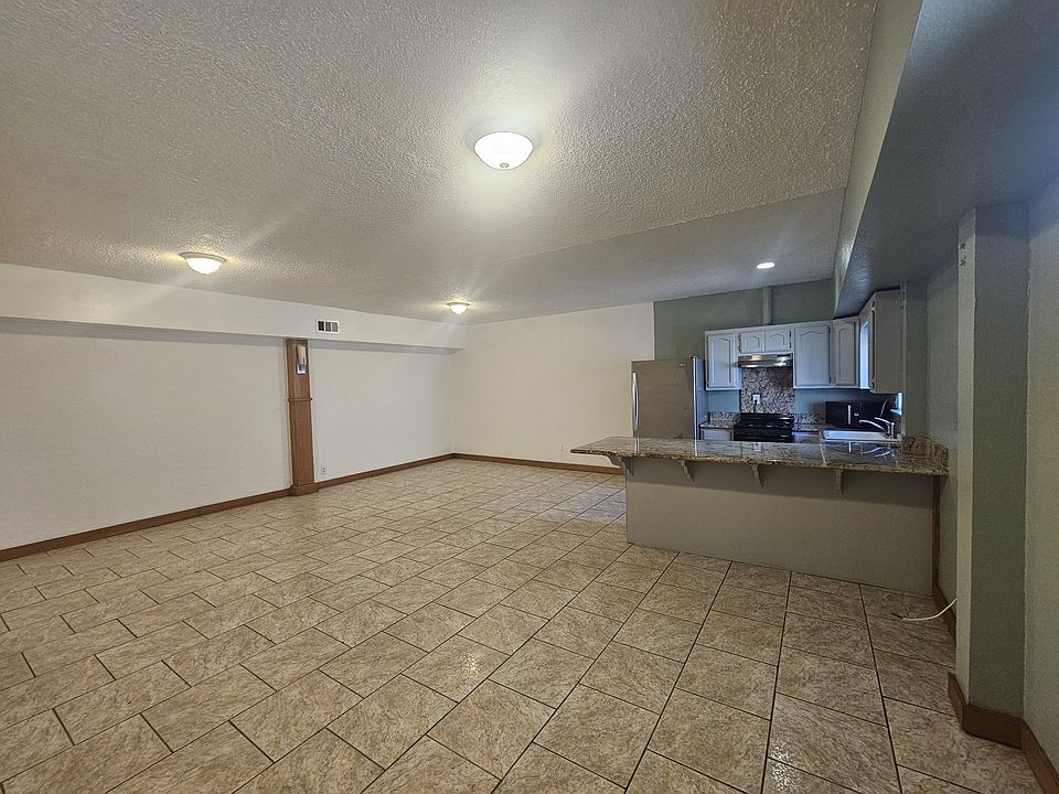 Living, Dining and Kitchen Areas