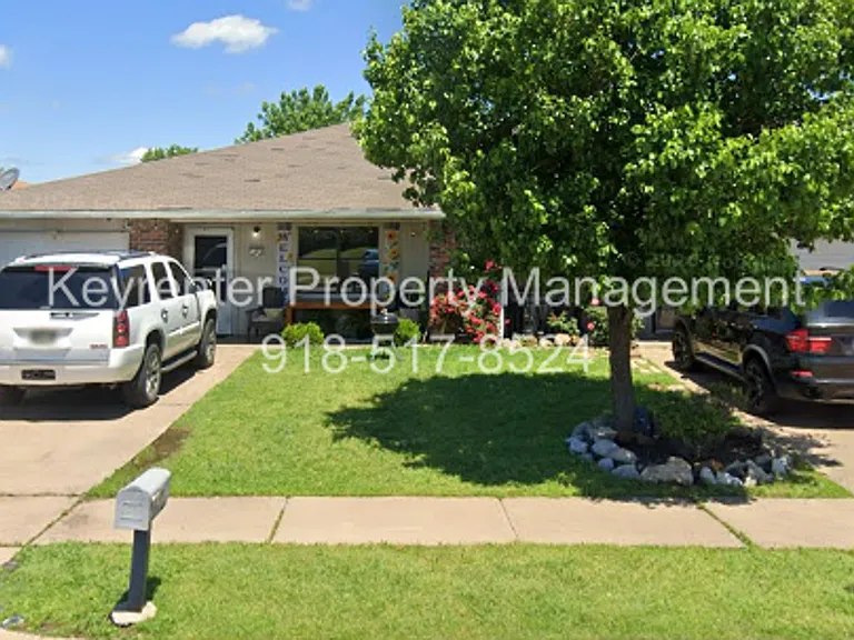 E 39th Pl Quadplex — Photo 1