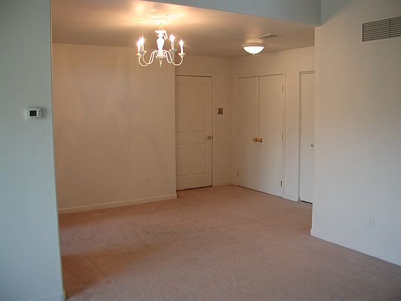Dining room at entry. Mechanical closet in double doors and coat closet.