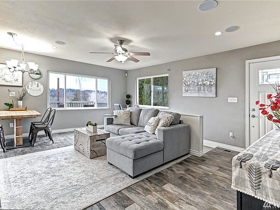 Light filled home, built in speakers and ceiling fan, territorial view.