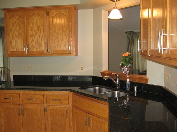Large kitchen with granite countertops