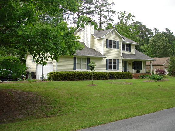 Front w/ garage (left)