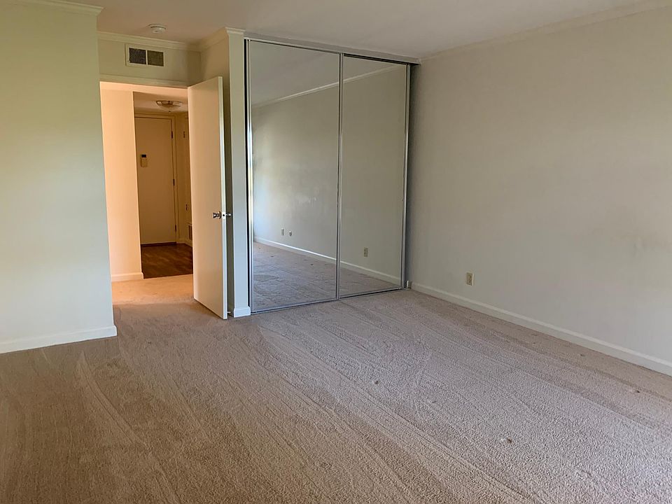 Bright, generous bedroom with a large mirrored closet! Plenty of storage space