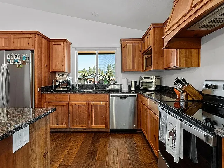 Beautiful hardwood cabinets and upgraded quartz counters.
