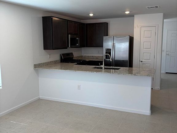 5th image of 12807 E Daisy Moore Pl