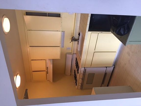 Kitchen area - includes full-sized stove and under-the-count