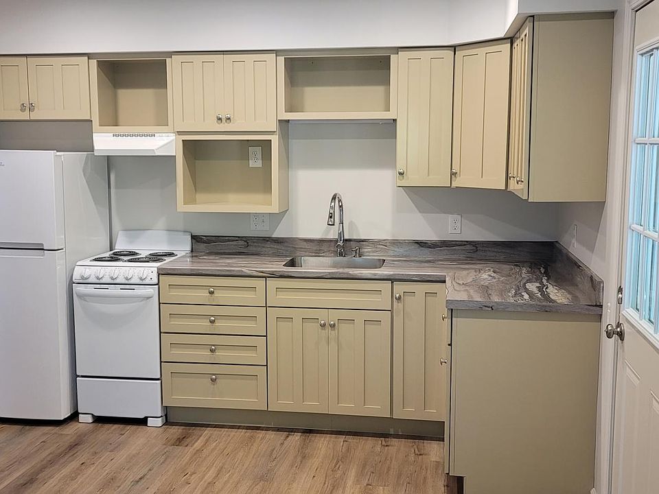 Kitchen with door to deck on right