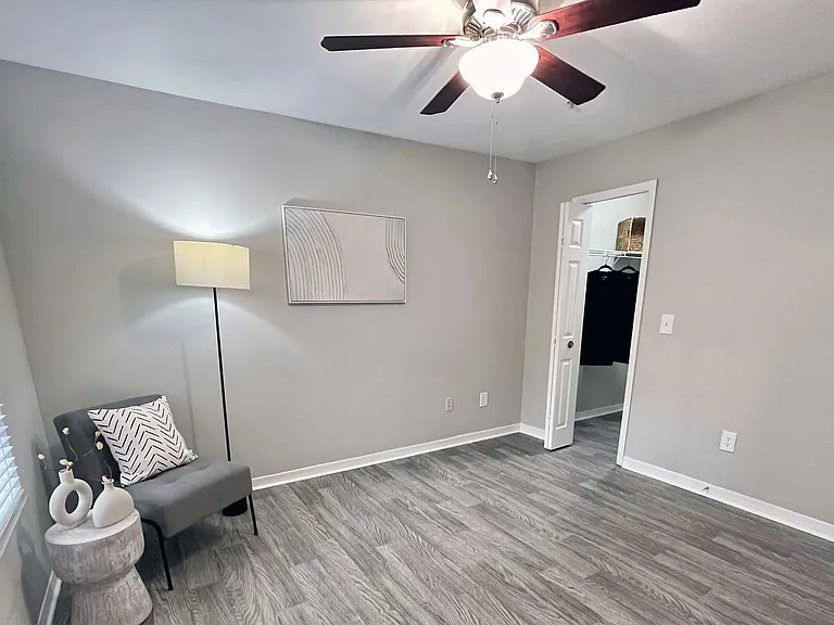 Master bedrooms offer a retreat with ceiling fans and spacious walk-in closets, providing comfort and convenience.