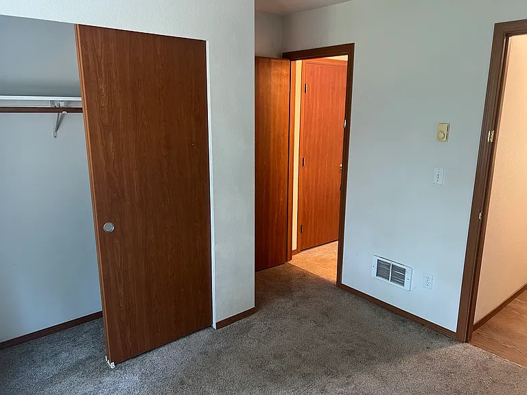 main floor bedroom access to 3/4 bathroom and laundry/kitchen