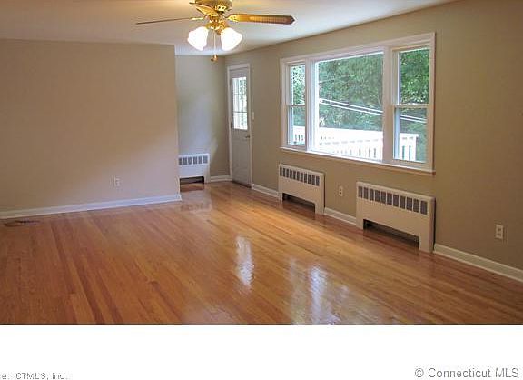 Living Room. Gleaming hardw...