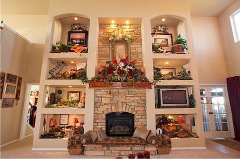 Stunning full wall 2 Story Stone Fireplace