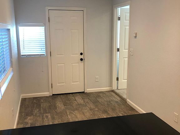 View from kitchen looking toward front door