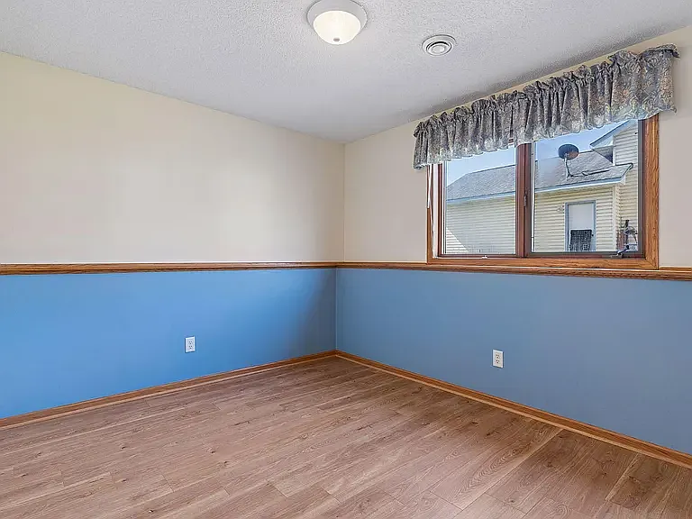 Downstairs bedroom #3 or great office space. Currently being painted a beautiful taupe to go with any decor.