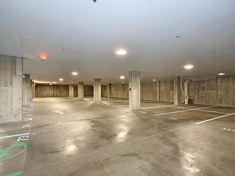 Explore the convenience and security of our spacious private parking facility.