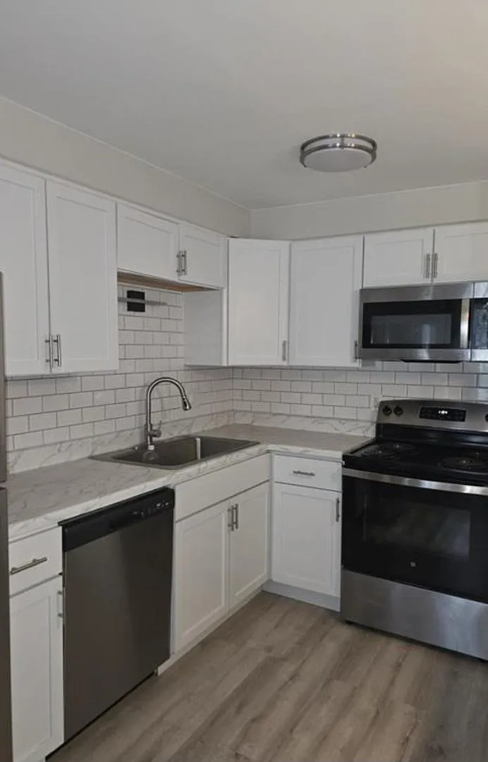 Villager Apartments — Photo 3