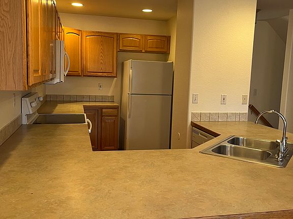 Large kitchen with breakfast bar and lots of storage