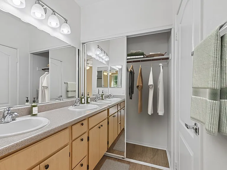 Classic Package I bath with laminate countertop, oak cabinetry, and hard surface flooring