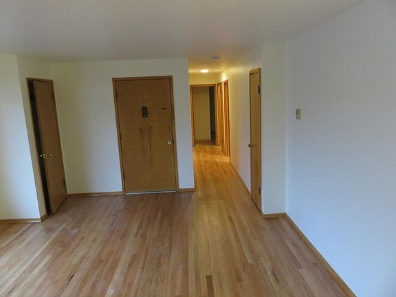 Entry Way, Coat Closet and Hallway to Bedrooms & Bath